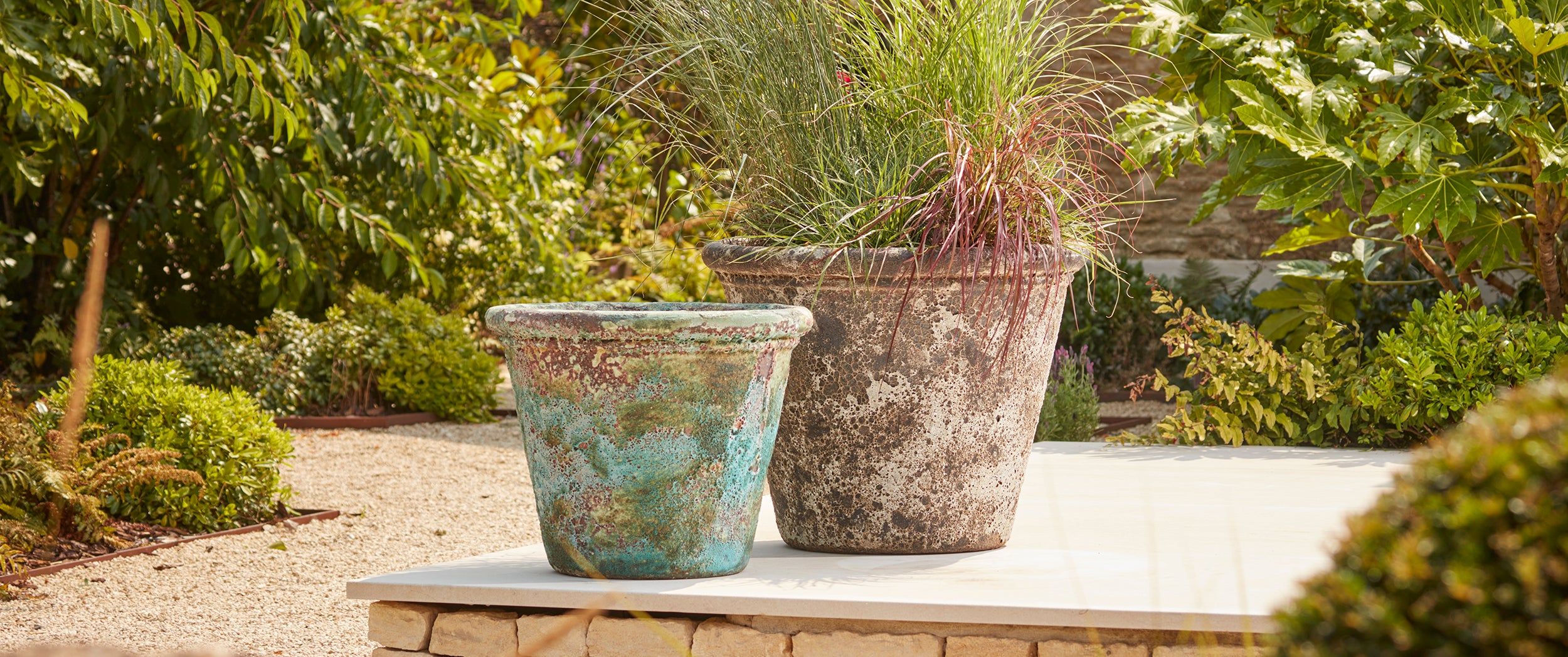 two antique ancient stone effect plant pots, 60cm turquoise and 70cm grey  