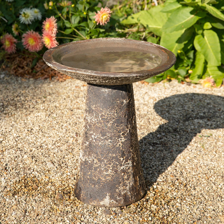 Close-up of the Ancient Salt Glaze Bird Bath’s pedestal, highlighting its rustic stone-effect finish and hand-applied texture.