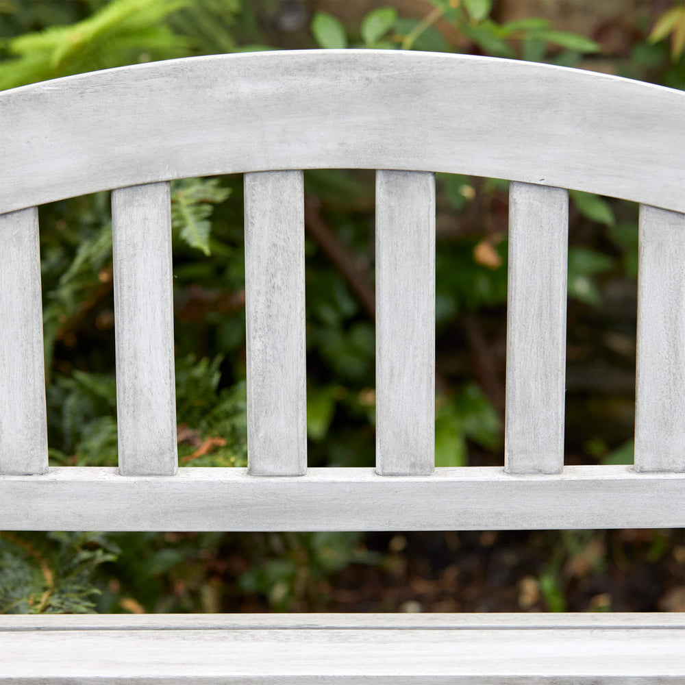 Elegant curved backrest of the Repton Queen Bench, designed for comfort and classic garden styling.